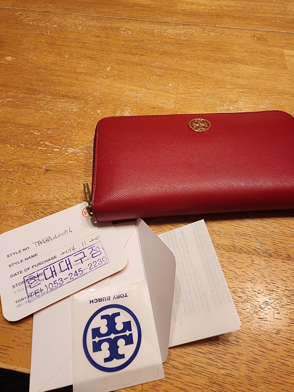 red Tory Burch Saffiano leather zip-around continental wallet